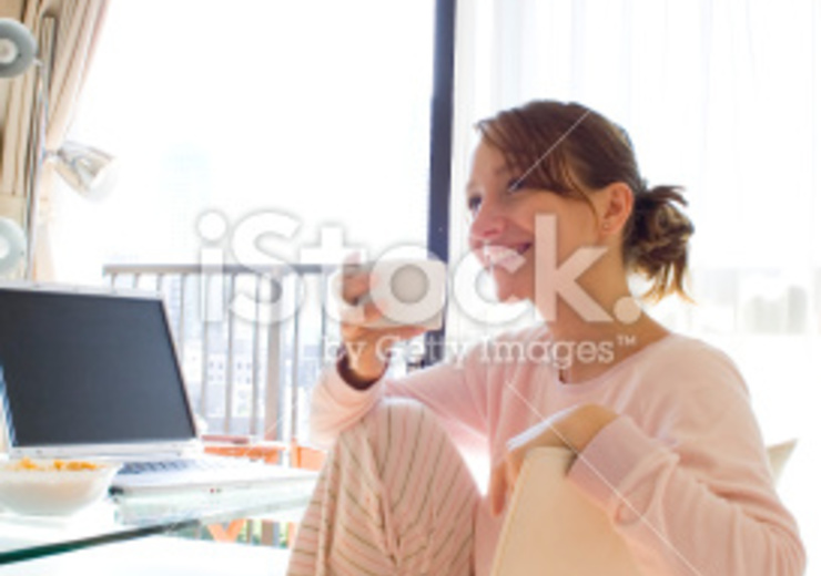 stock photo 2855886 girl with laptop at breakfast bei Muster Elektro in Musterstadt